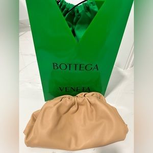 Bottega Veneta "The Pouch" clutch bag in buttery soft calf leather.